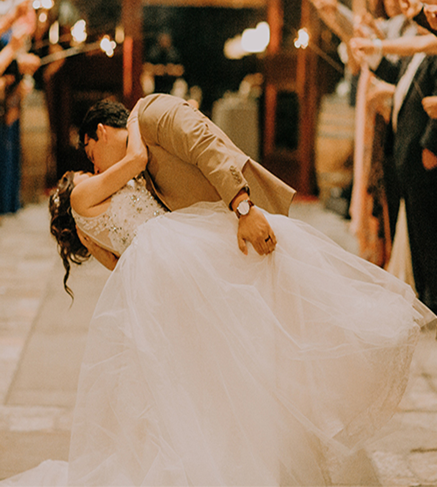 bride and groom first kiss