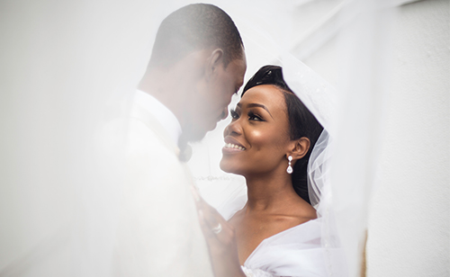 bride and groom hugging